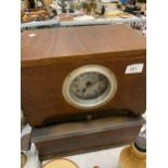 A VINTAGE 'BLICK TIME RECORDERS' CLOCKING IN CLOCK IN A MAHOGANY CASE