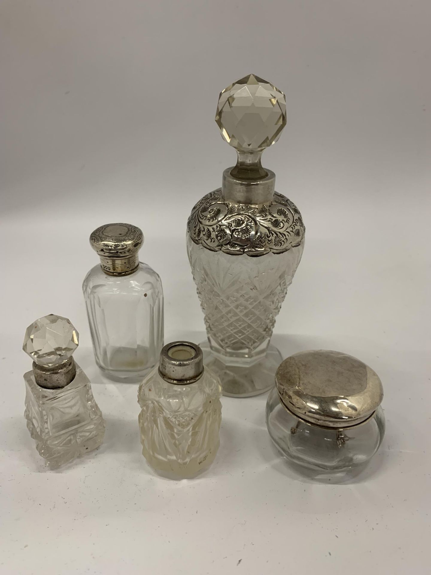 FIVE HALLMARKED SILVER AND CUT GLASS ITEMS, PERFUME BOTTLES ETC