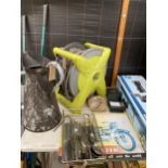 AN ASSORTMENT OF ITEMS TO INCLUDE A LARGE VINTAGE OIL JUG, A HOSE PIPE AND A TIN SIGN ETC