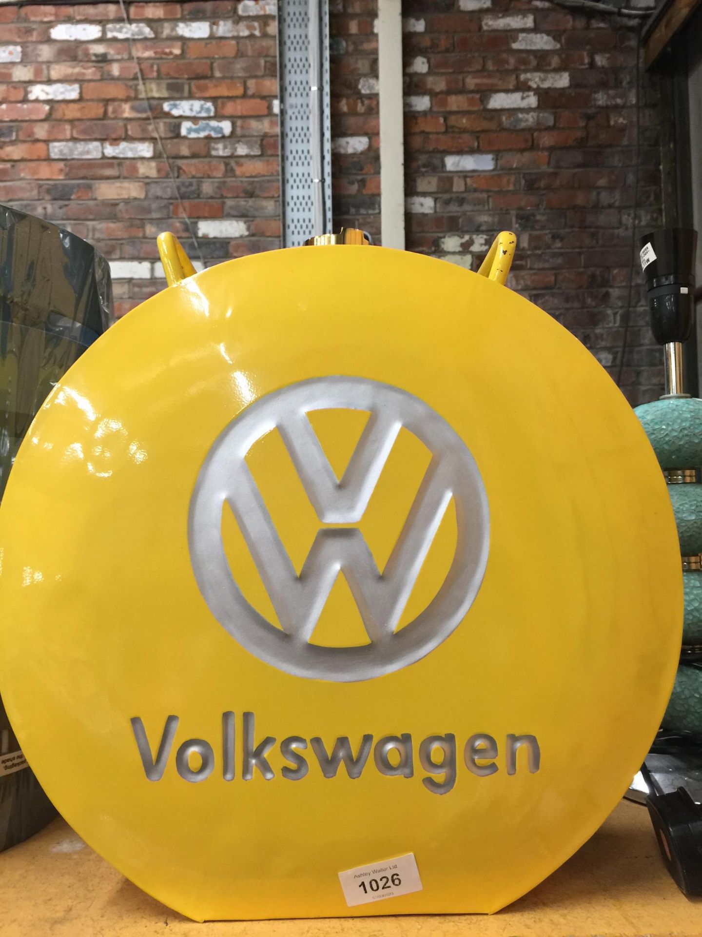 A YELLOW VOLKSWAGON PETROL CAN