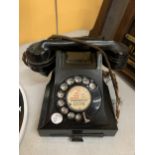 A VINTAGE BLACK BAKELITE TELEPHONE