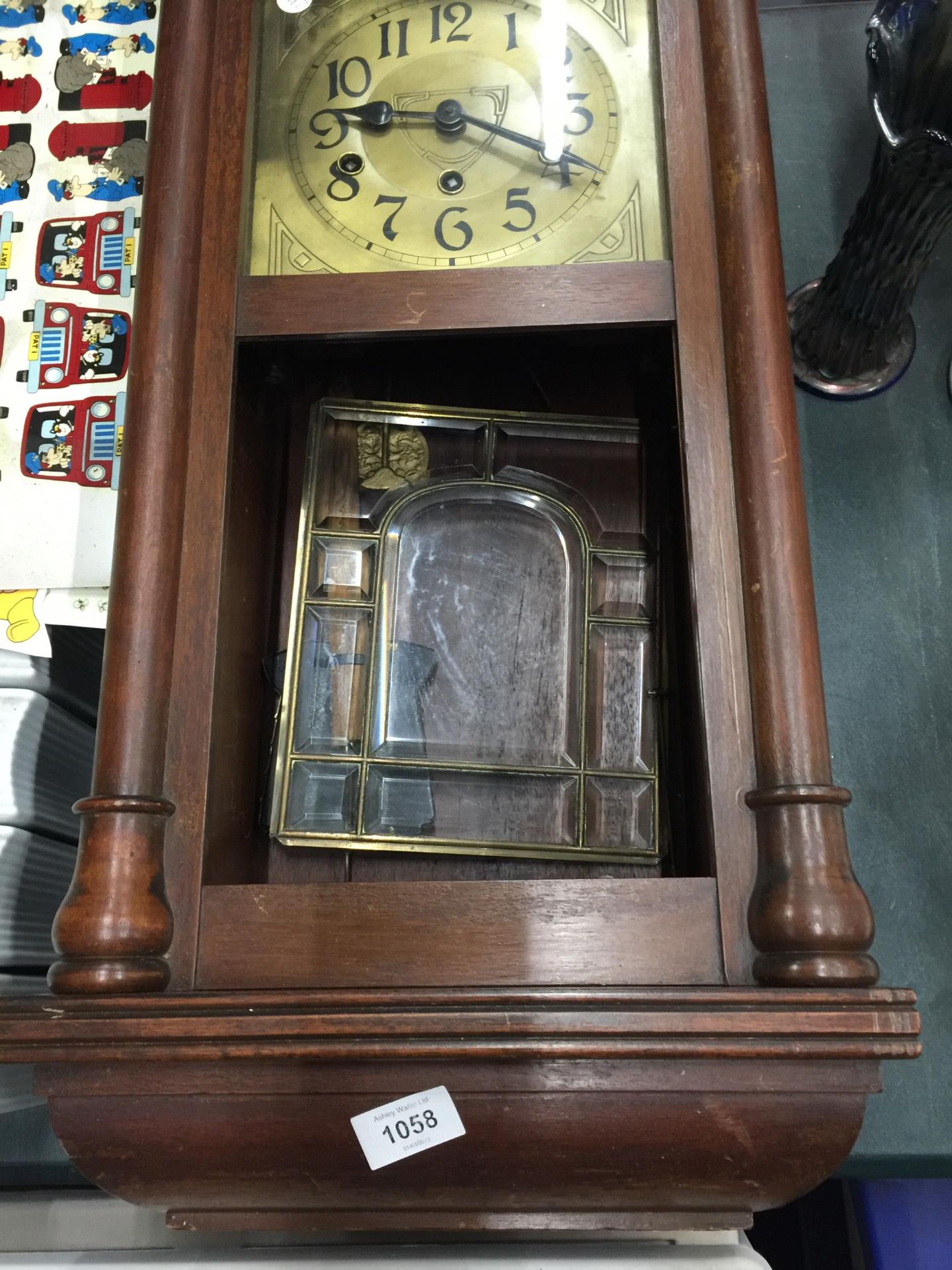 A MAHOGANY FRAMED WALL CLOCK WITH BEVELLED GLASS DOOR, PENDULUM AND KEY IN NEED OF SOME - Image 5 of 8
