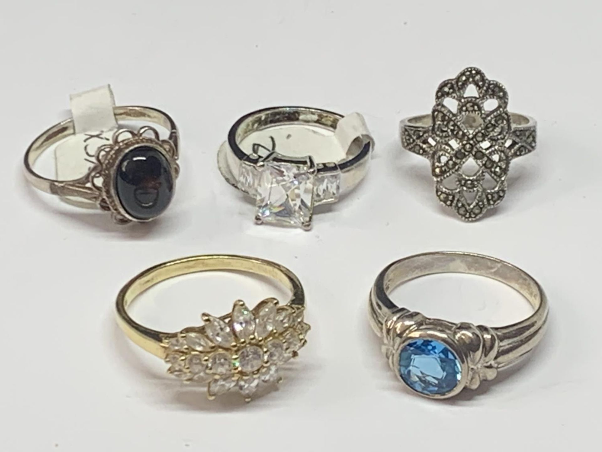 FIVE VARIOUS SILVER RINGS