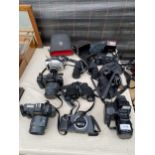 AN ASSORTMENT OF PHOTOGRAPHY EQUIPMENT TO INCLUDE TWO CANON T80 CAMERAS, AN OLYMPUS CAMERA AND A
