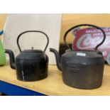 TWO VINTAGE CAST IRON KETTLES - ONE WITH MISSING LID