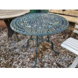 A ROUND CAST ALLOY BISTRO TABLE