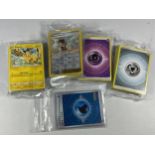 A COLLECTION OF POKEMON CARDS TOGETHER WITH SEALED ENERGY CARDS AND JAPANESE POKEMON GO ENERGY CARDS