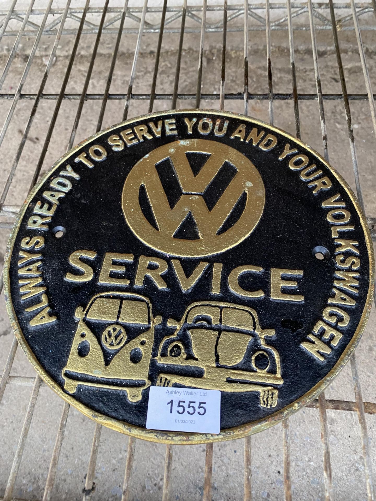 A CAST VW SERVICE SIGN
