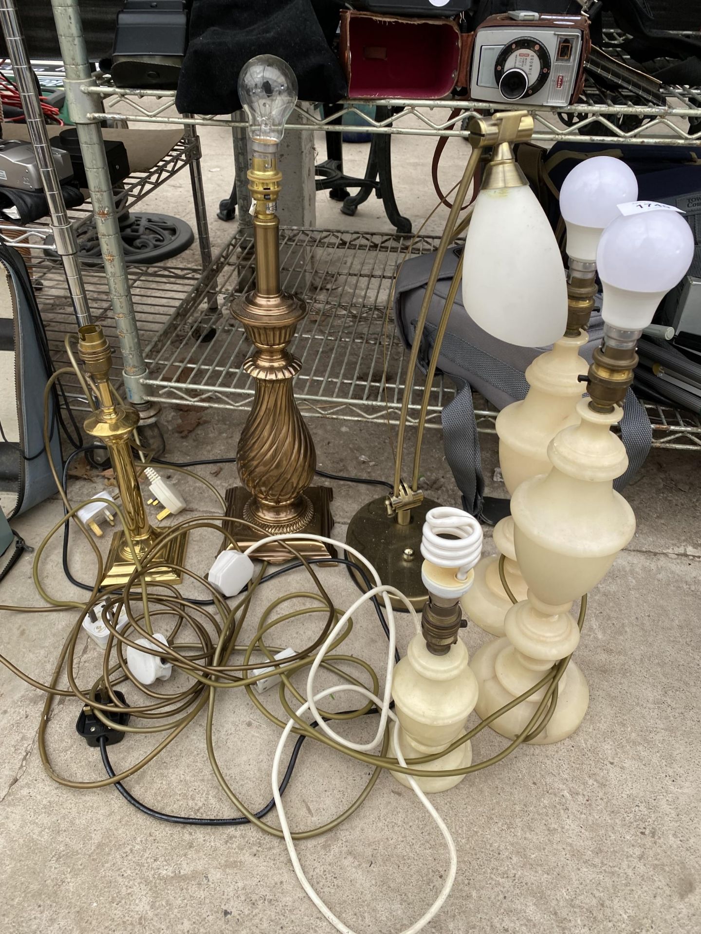 AN ASSORTMENT OF TABLE LAMPS TO INCLUDE THREE ONYX EXAMPLES