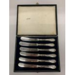 A CASED SET OF SIX CASED HALLMARKED SILVER HANDLED BUTTER KNIVES