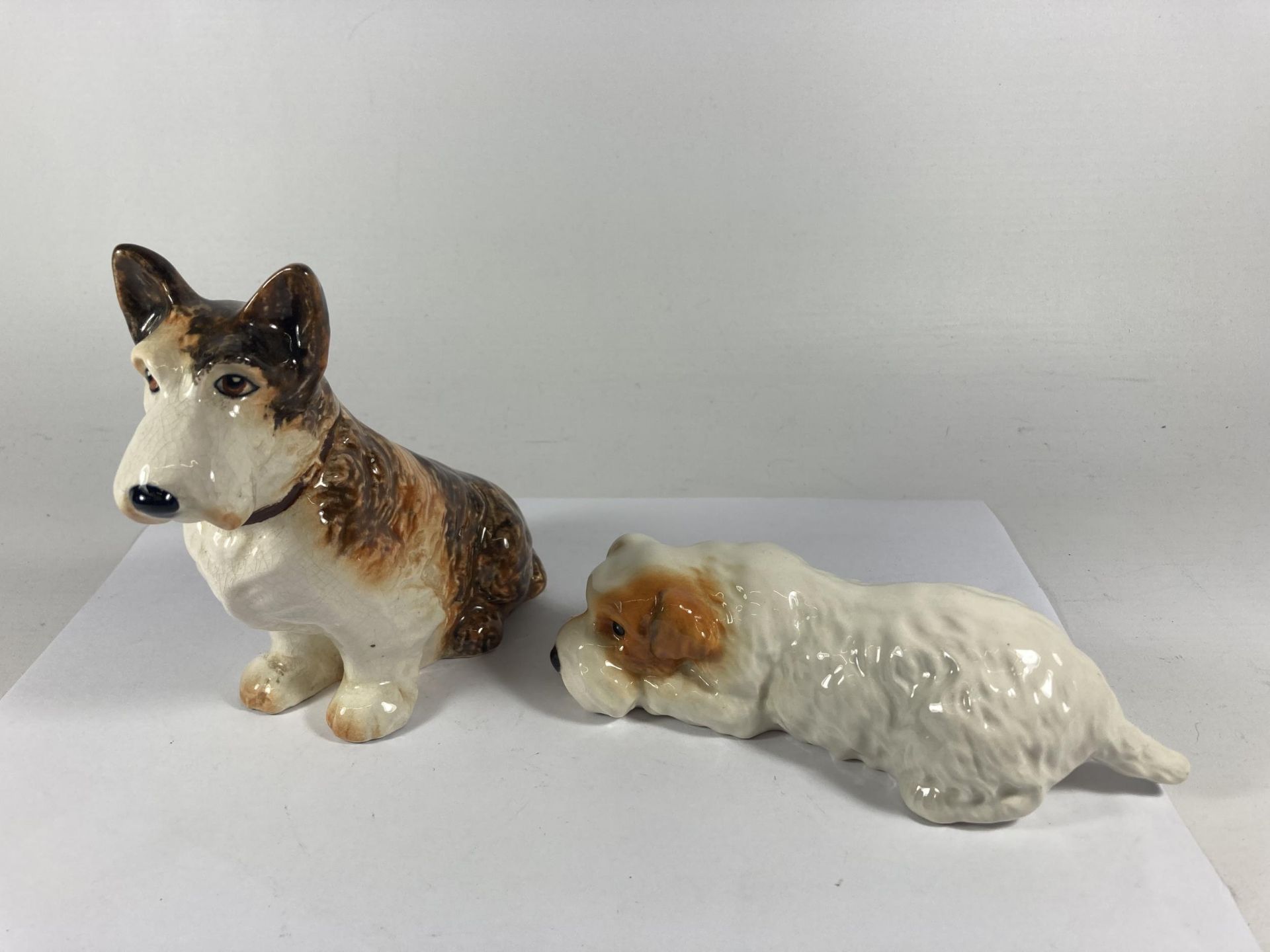 TWO DOG FIGURES TO INCLUDE A BESWICK AND A SYLVAC