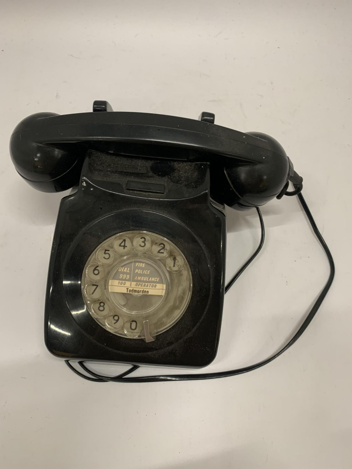 A VINTAGE BLACK TELEPHONE