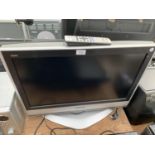 A PANASONIC 26" TELEVISION WITH REMOTE CONTROL