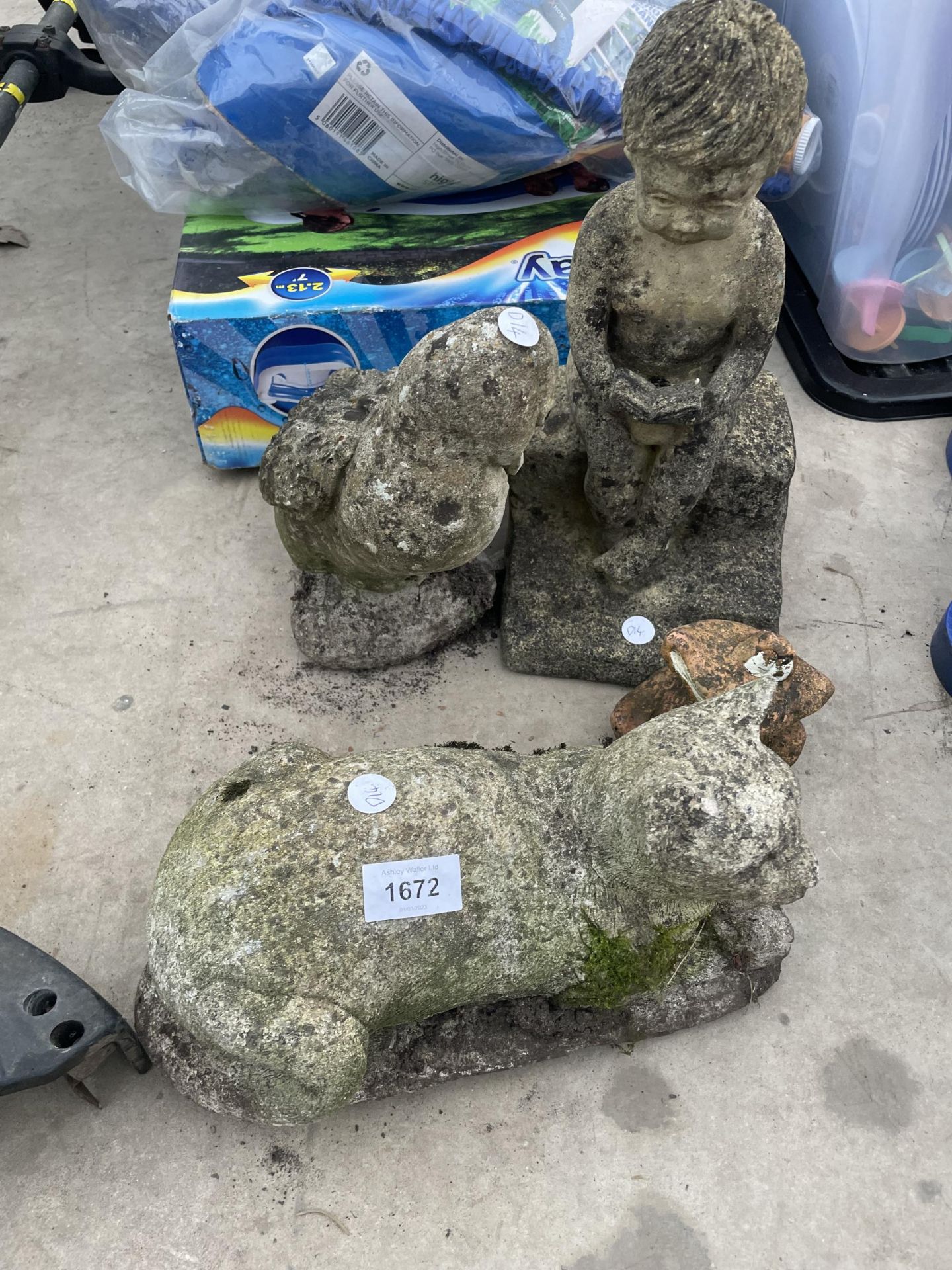 THREE RECONSTITUTED STONE GARDEN FIGURES TO INCLUDE A CAT AND A BIRD ETC