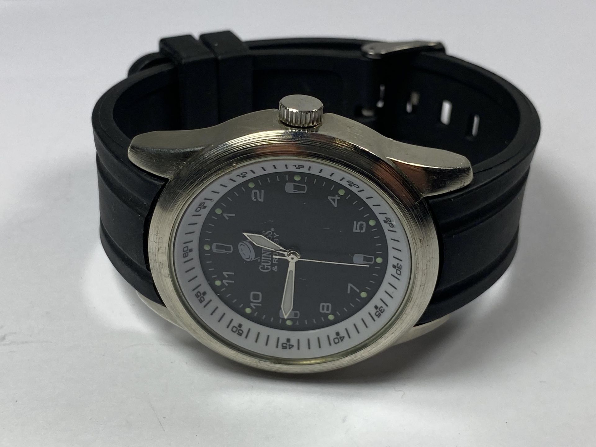 A GUINNESS WRIST WATCH