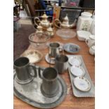 AN ASSORTMENT OF METAL WARE ITEMS TO INCLUDE PEWTER TANKARDS AND A SILVER PLATE TEA SERVICE ETC