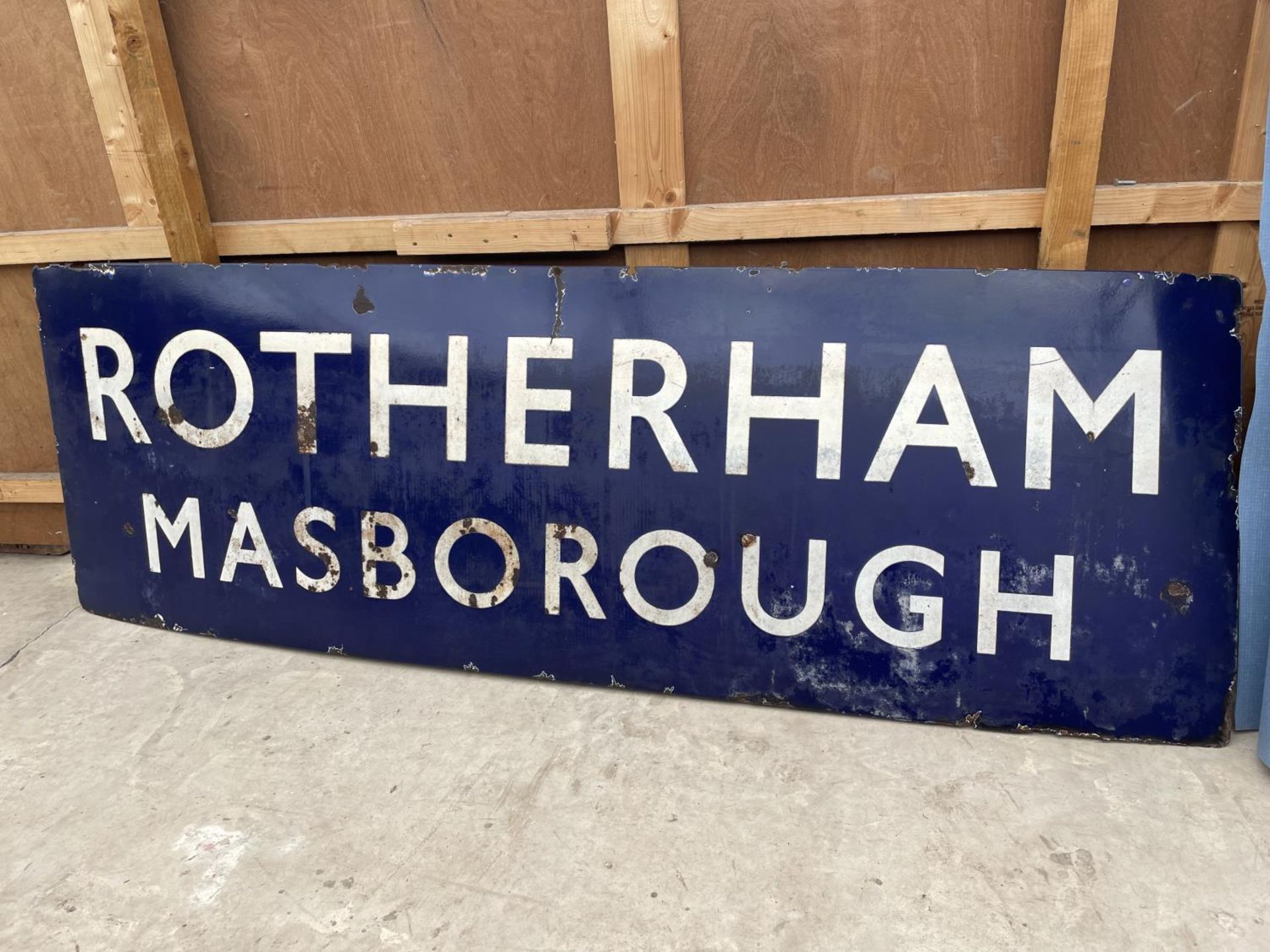 A VINTAGE ENAMEL RUNNING IN BOARD PLATFORM SIGN FOR ROTHERHAM MASBOROUGH. THIS WAS A LONDON