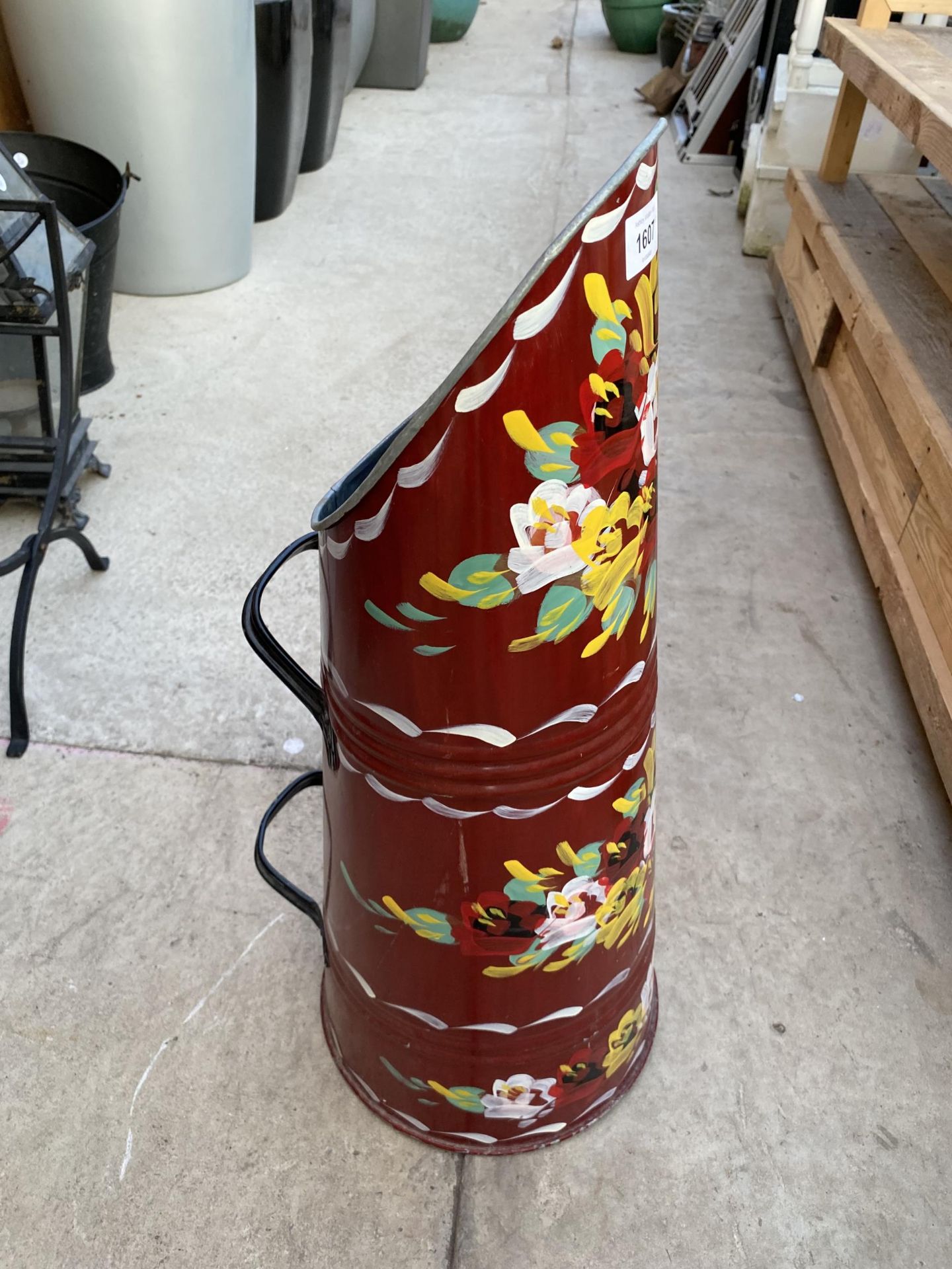 A DECORATIVE PAINTED METAL COAL SKUTTLE