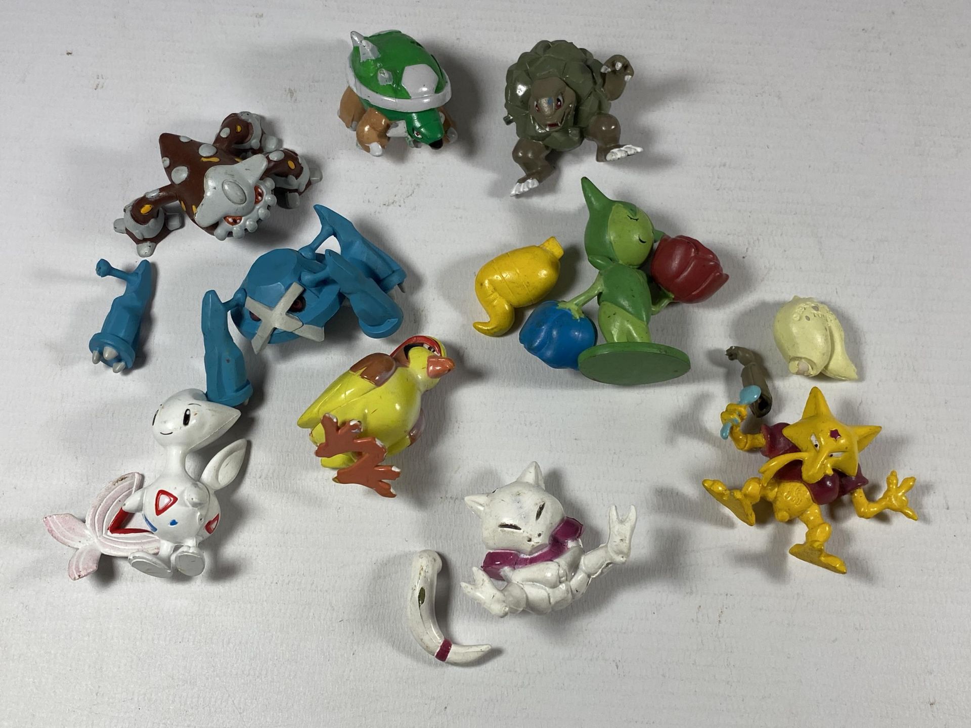 A MIXED LOT OF POKEMON FIGURES