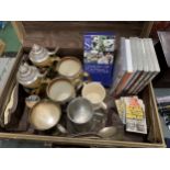 A VINTAGE ANTLER SUITCASE CONTAINING STEINS, TANKARDS FOOTBALL DVD'S, ETC