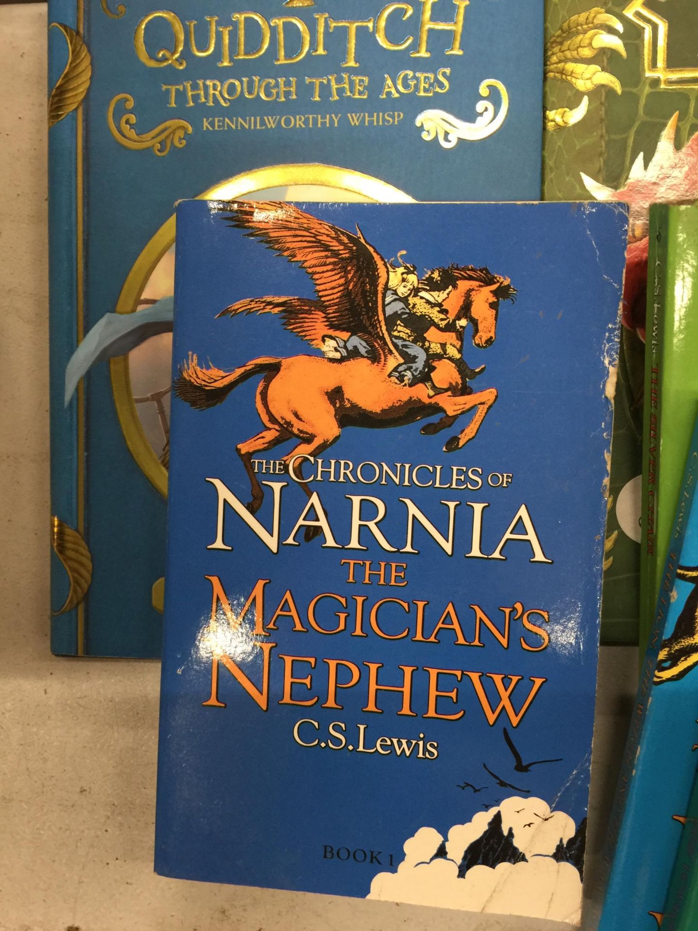 FIVE C. S. LEWIS CHRONICLES OF NARNIA PAPERBACKS PLUS TWO J. K. ROWLING BOOKS - Image 3 of 6