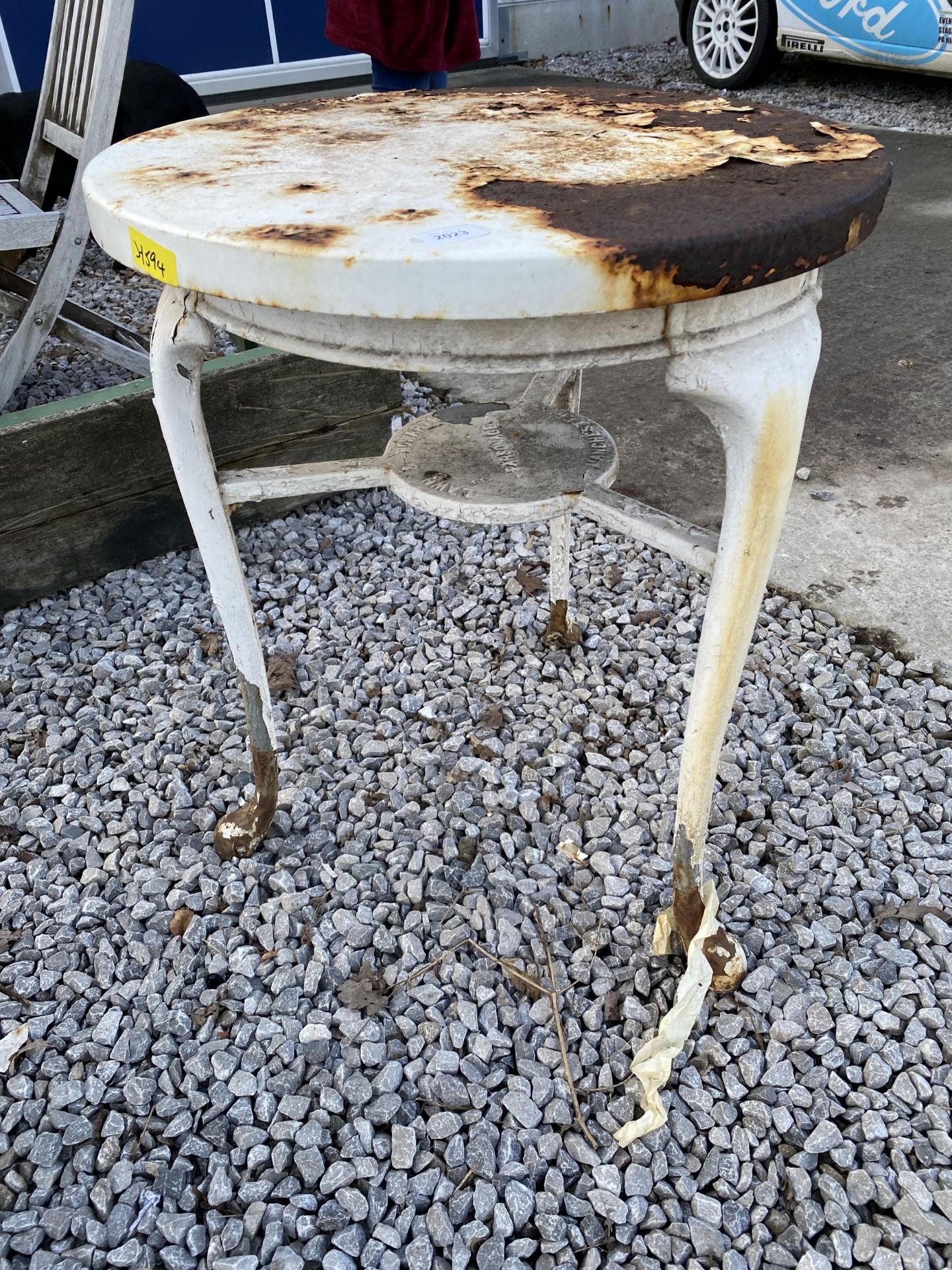 A HEAVY CAST IRON PUB TABLE