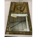 A VINTAGE BRASS FRAMED MIRROR WITH GALLEON TOP AND TWO BRUSHES