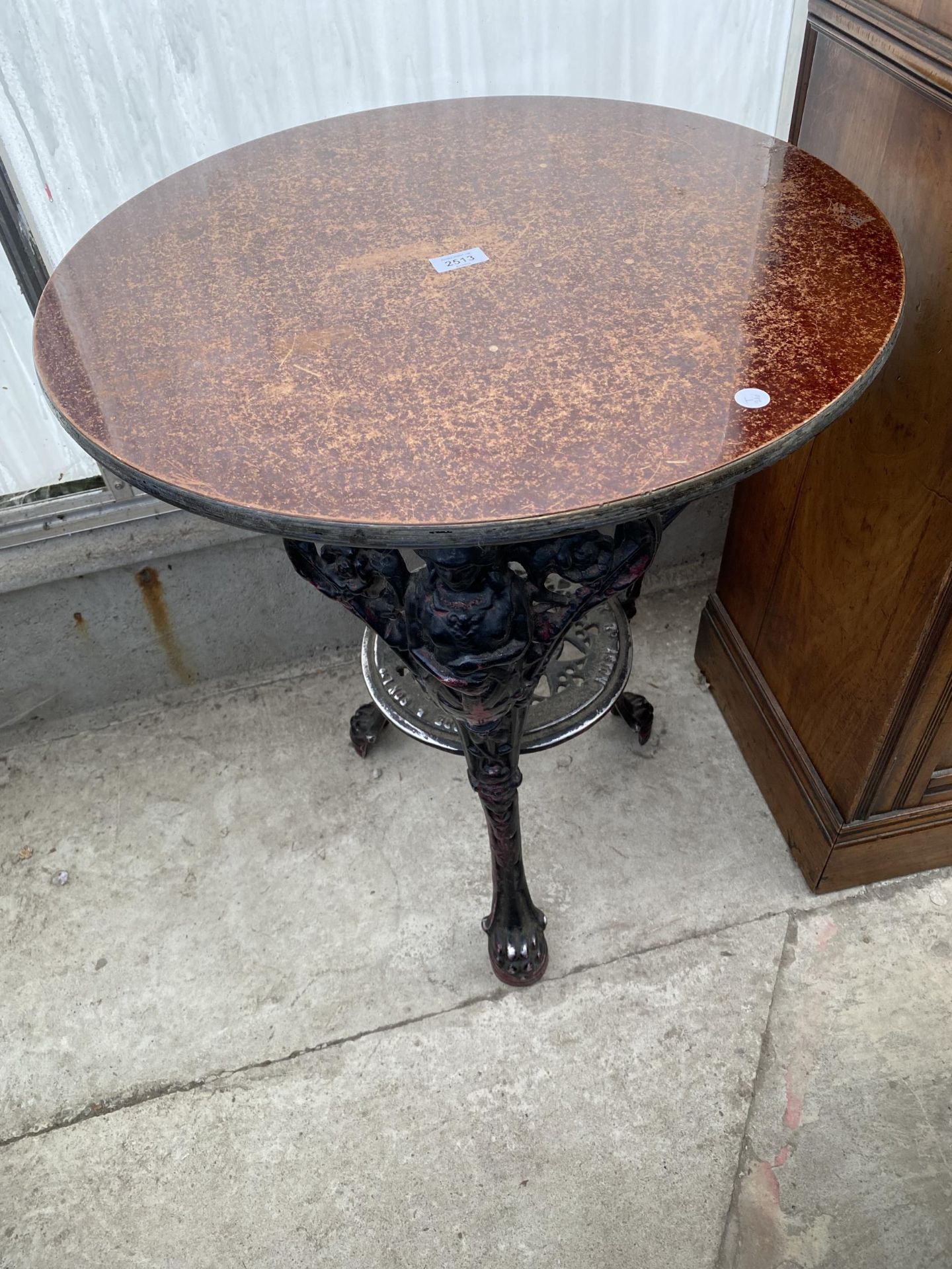 A CAST METAL BRITANNIA PUB TABLE, 24" DIAMETER