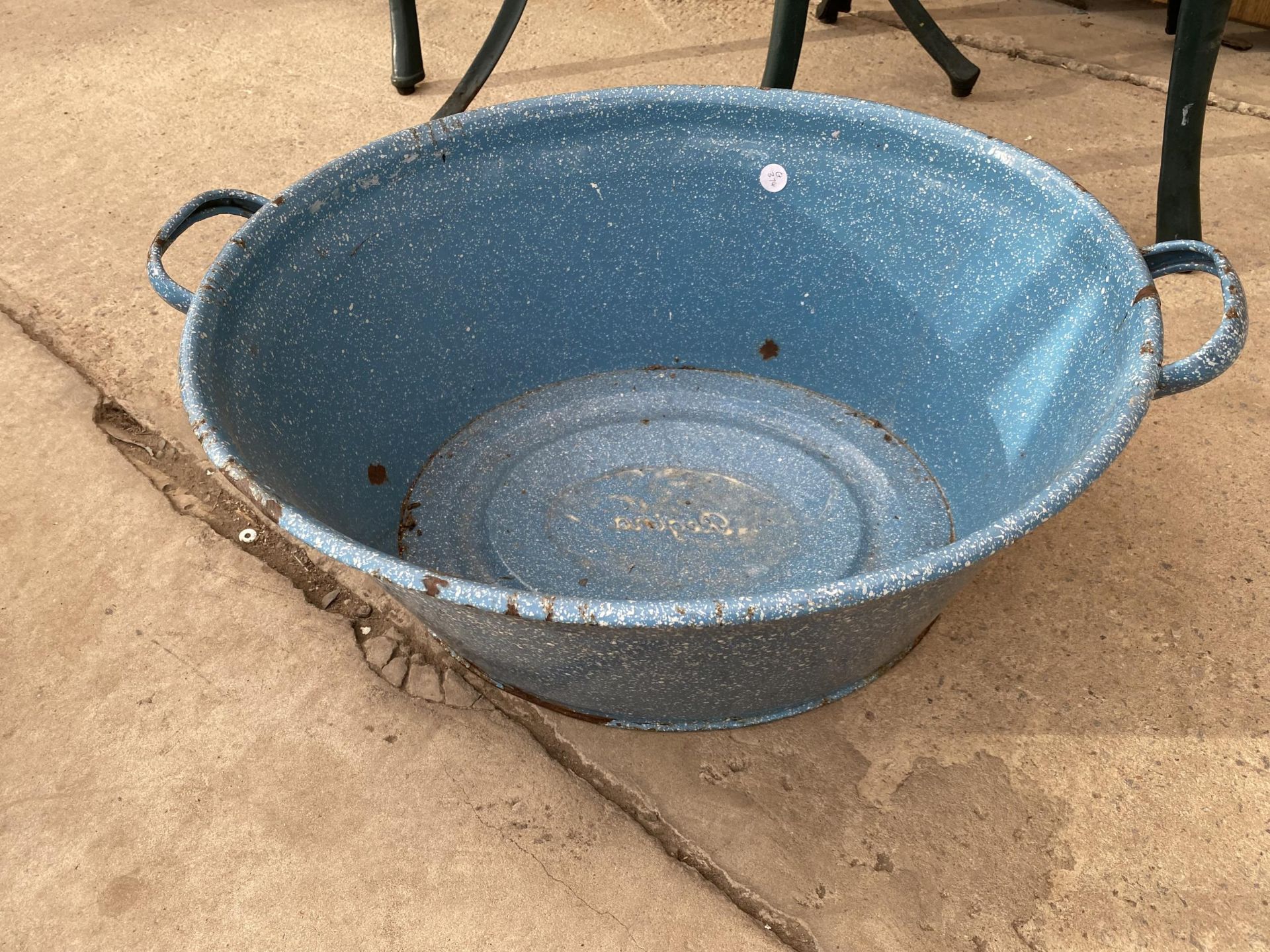 A SMALL BLUE ENAMEL BATH