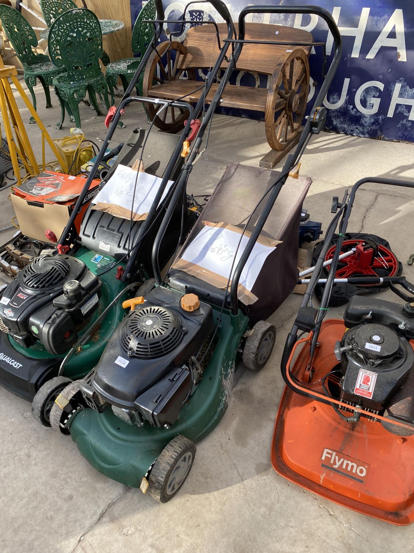 A PETROL ENGINE LAWN MOWER WITH GRASS BOX