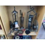 AN ASSORTMENT OF FIRESIDE COMPANION ITEMS TO INCLUDE BRUSHES, BELLOWS AND SHOVELS ETC