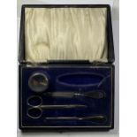 A CASED CHESTER HALLMARKED SILVER MANICURE SET (MISSING ONE ITEM)
