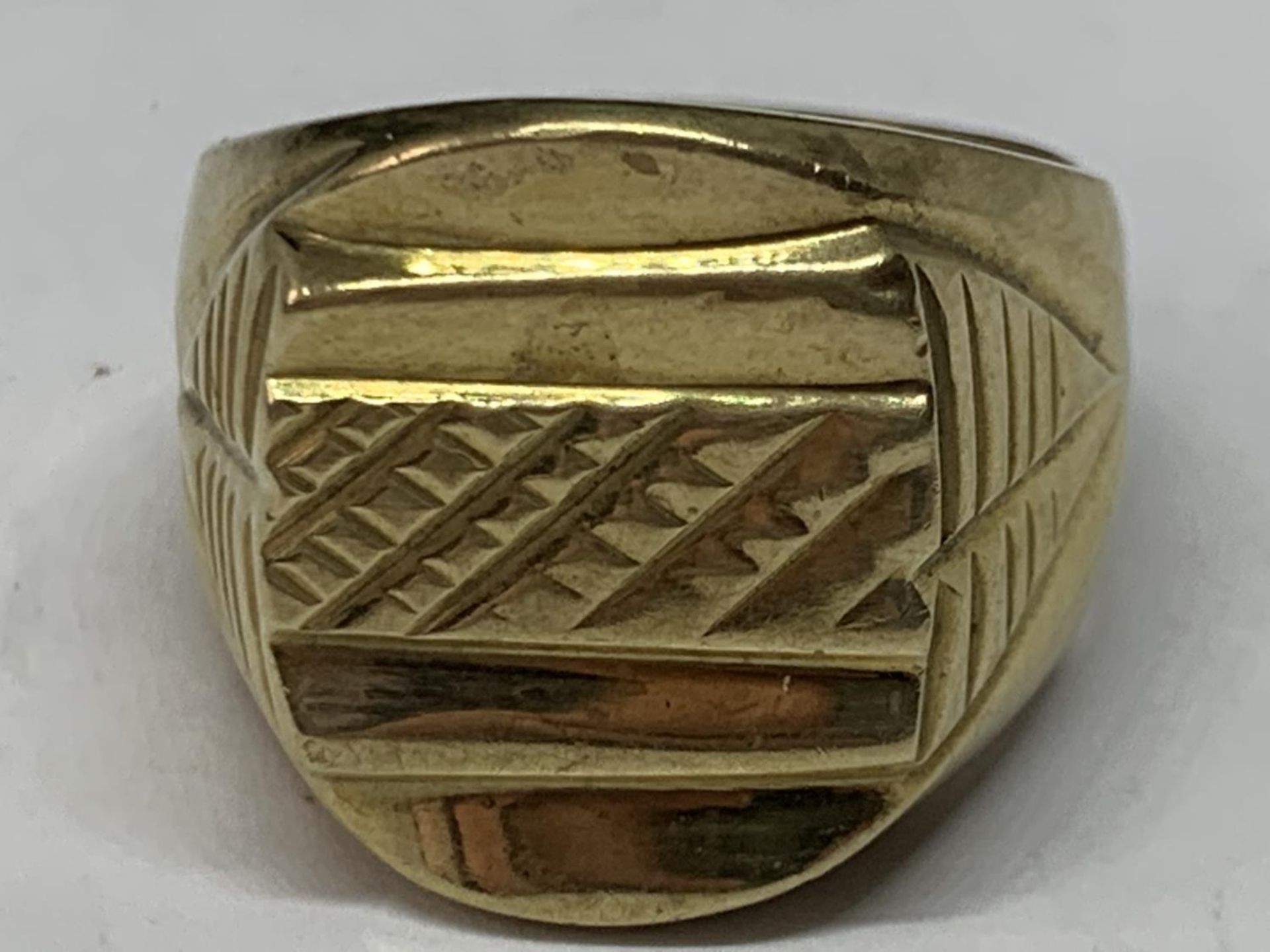 A YELLOW METAL RING