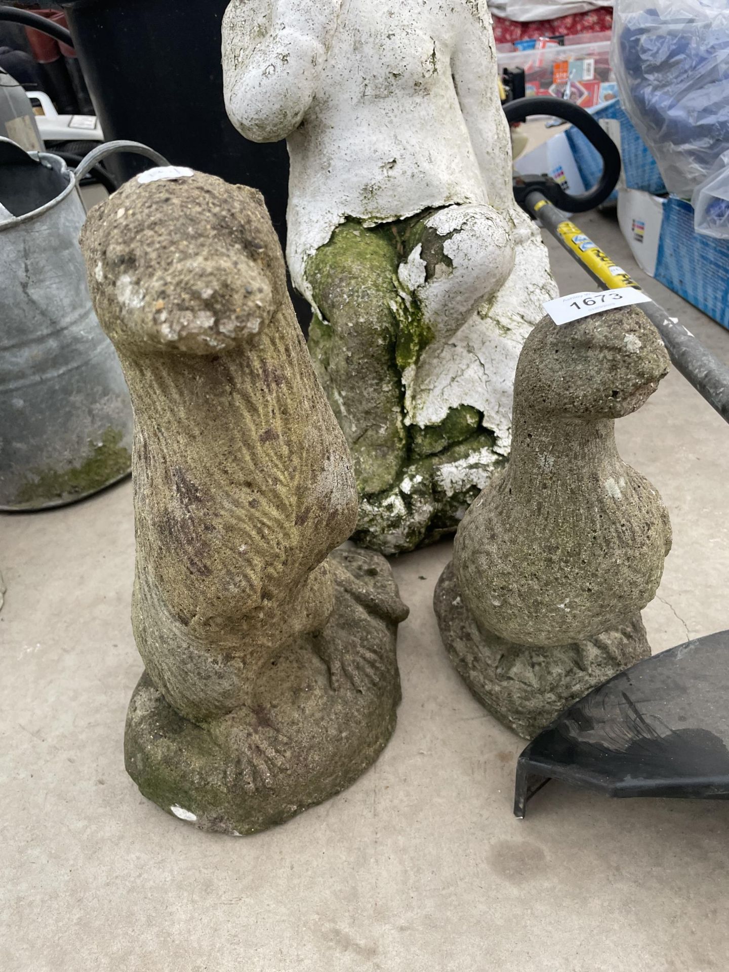 THREE RECONSTITUTED STONE GARDEN FIGURES TO INCLUDE AN OTTER AND A CHERUB ETC - Image 2 of 2