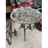 A ROUND CAST ALLOY BISTRO TABLE WITH ROSE DETAIL