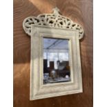 A DECORATIVE CREAM PAINTED WOODEN FRAMED WALL MIRROR