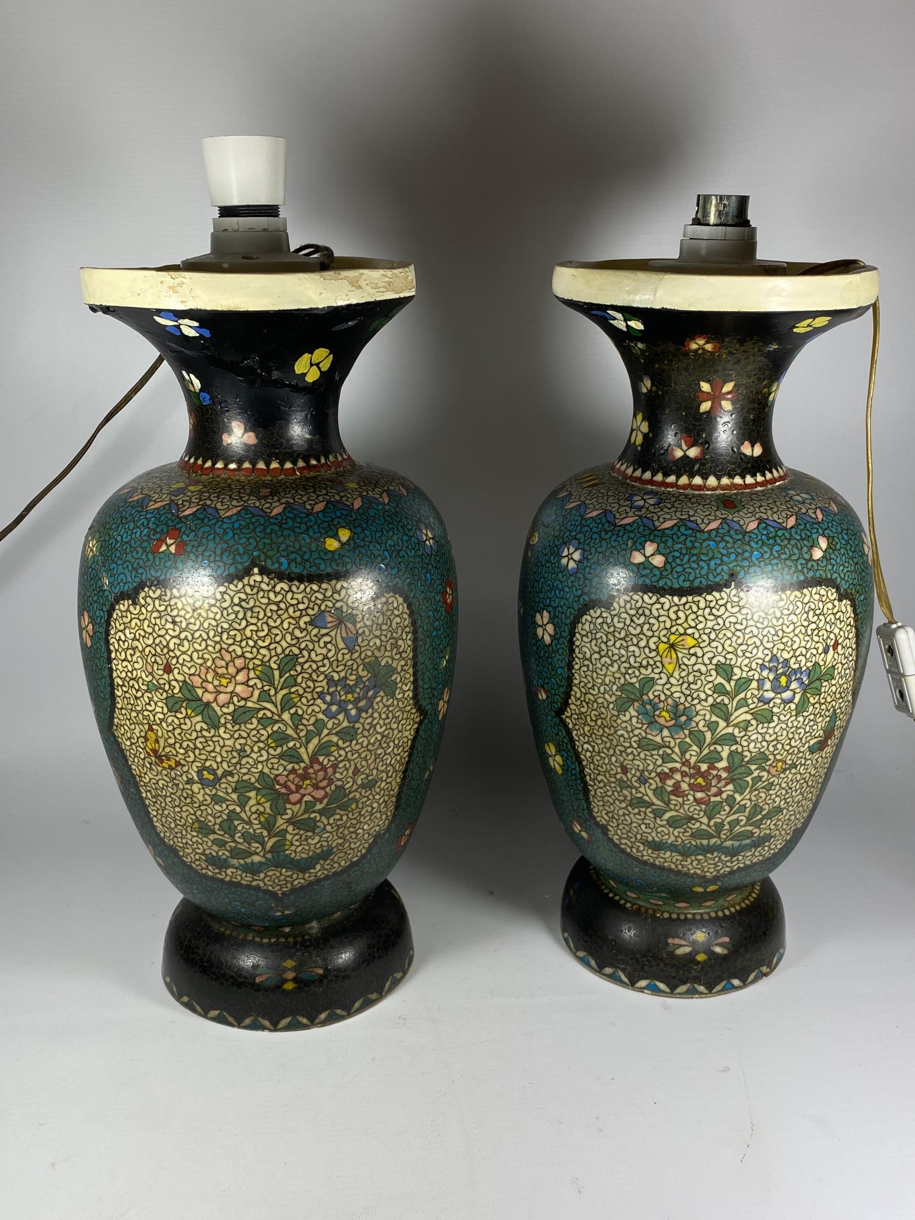 A PAIR OF JAPANESE MEIJI PERIOD (1868-1912) SATSUMA POTTERY CONVERTED LAMP BASES IN THE CLOISONNE