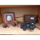 A PAIR OF VINTAGE DOLLOND BINOCULARS, TWO TREEN ELEPHANTS AND AN ORIENTAL WALL PLAQUE ETC