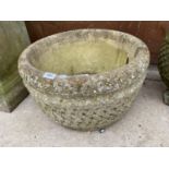 A RECONSTITUTED STONE CIRCULAR PLANTER BEARING THE NAME 'COTSWOLDS STUDIO' (H:30CM D:52CM)