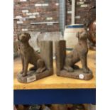 A PAIR OF RECONSTITUTED STONE DOG BOOK ENDS