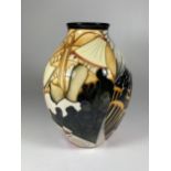 A LIMITED EDITION MOORCROFT 'OPEN DAY' PATTERN VASE, NO.14/15, HEIGHT 21CM