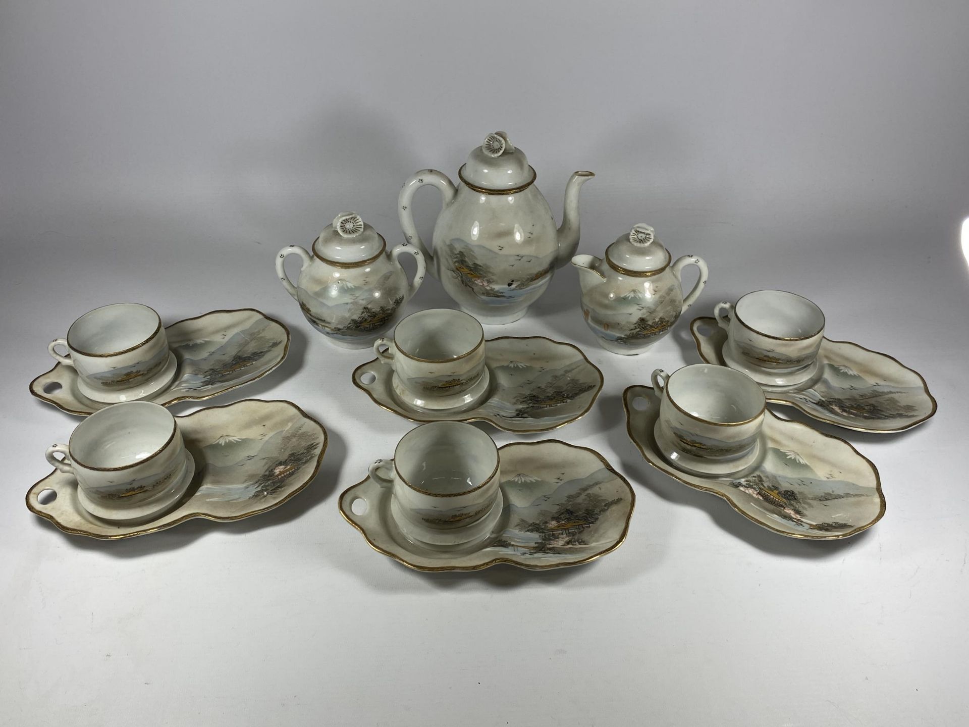 A LARGE CHINESE EGGSHELL PORCELAIN DINNER SERVICE COMPRISING TEAPOT, SUGAR BOWL, CREAM JUG & SIX