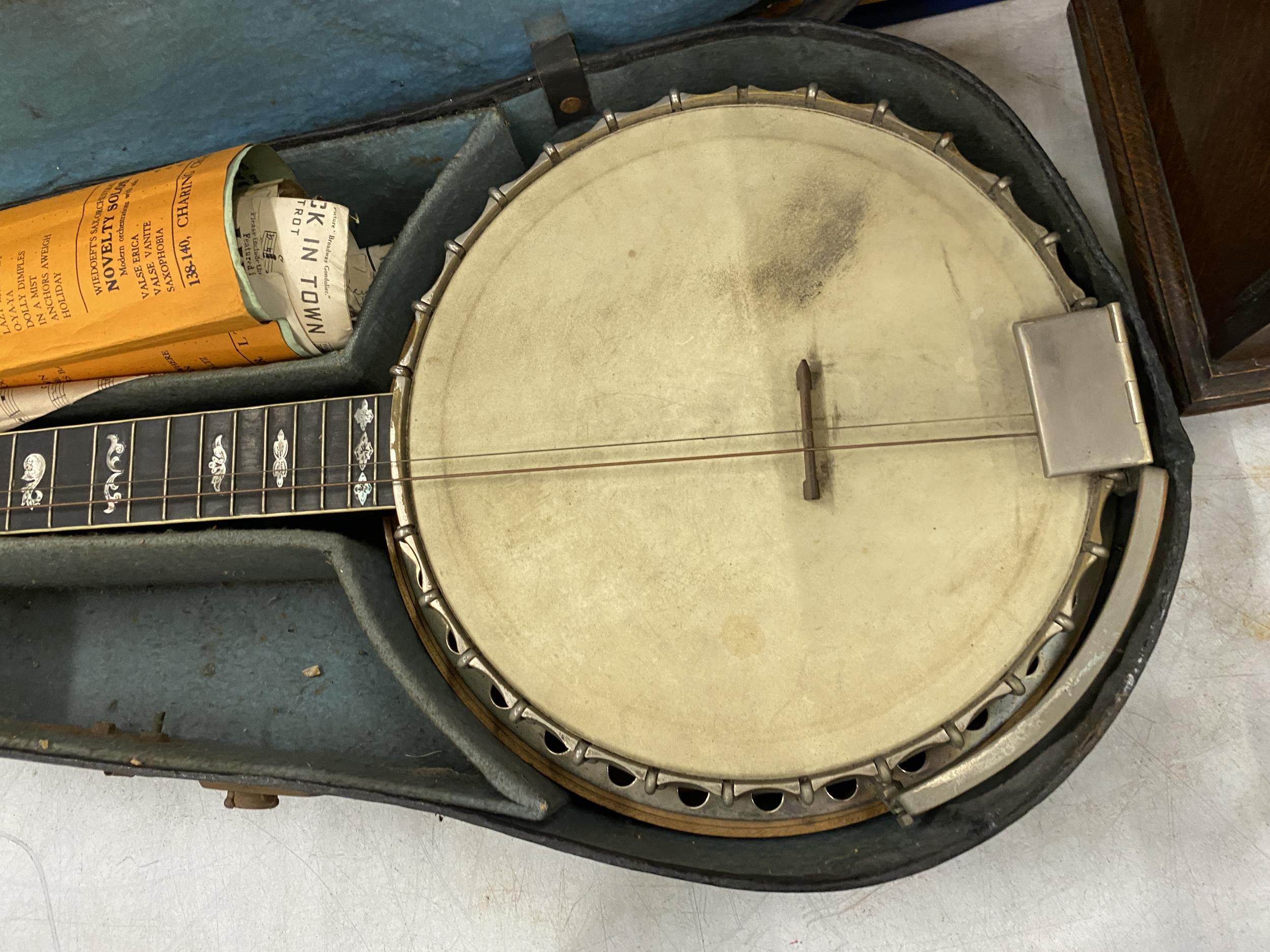 A VINTAGE CASED 'PARAGON' BANJO WITH MOTHER OF PEARL FRETBOARD - Image 2 of 5