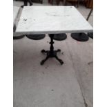 A PUB TABLE WITH WOODEN TOP AND CAST IRON TABLE BASE (79CM x 79CM)