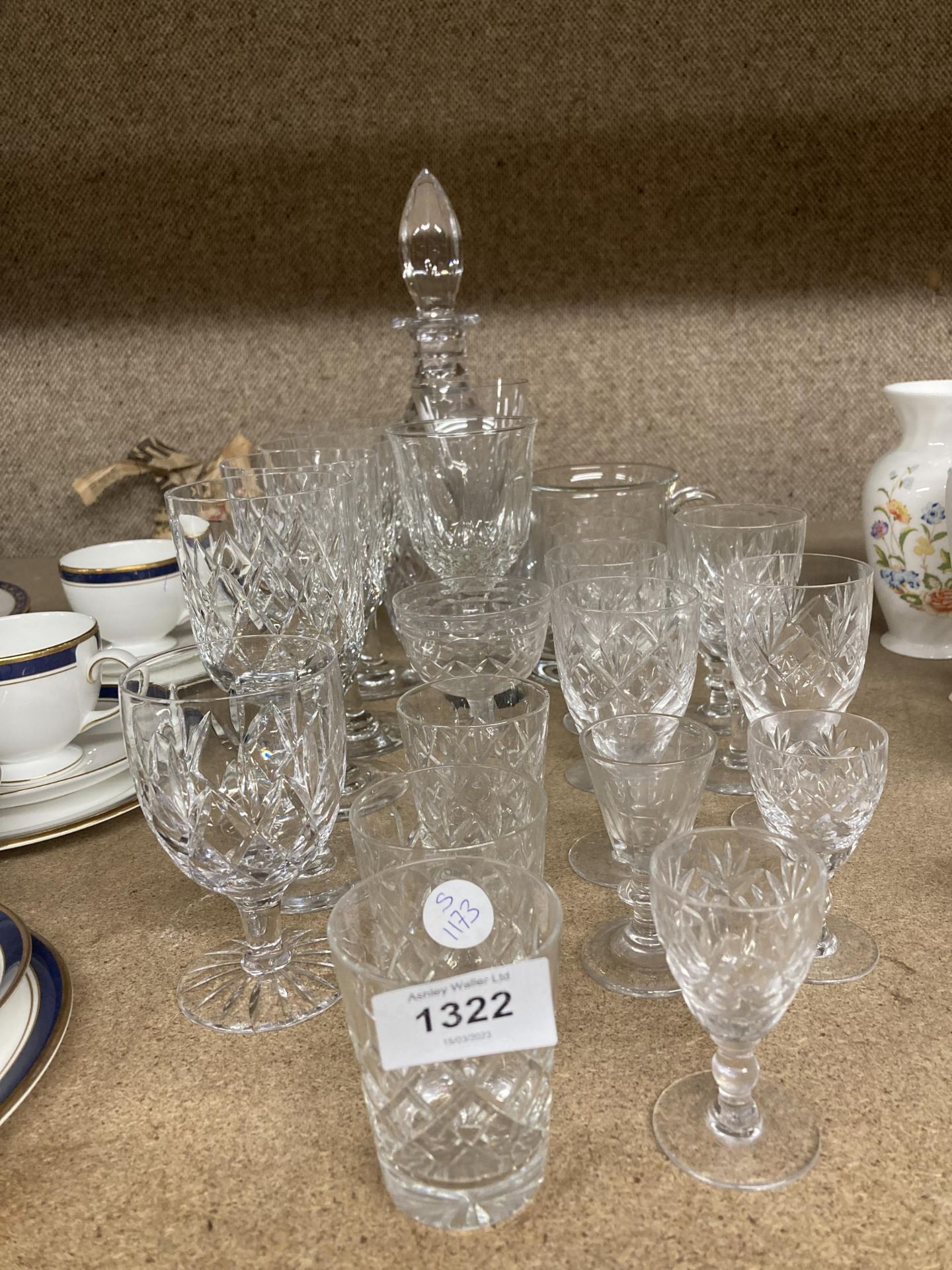 A QUANTITY OF GLASSWARE TO INCLUDE A DECANTER, JUG, WINE GLASSES, SHERRY GLASSES ETC.,