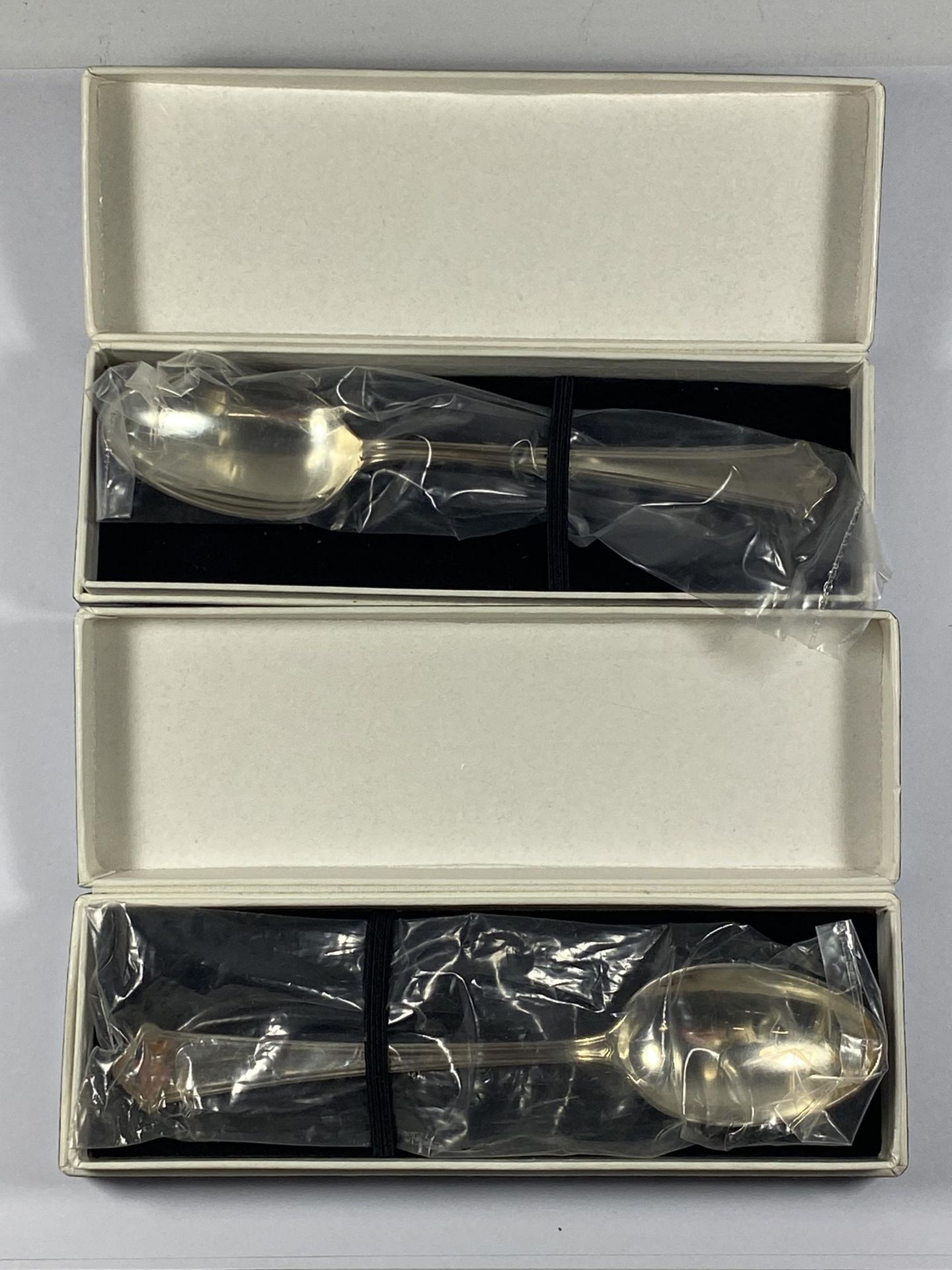 TWO BOXED HALLMARKED SILVER TEASPOONS