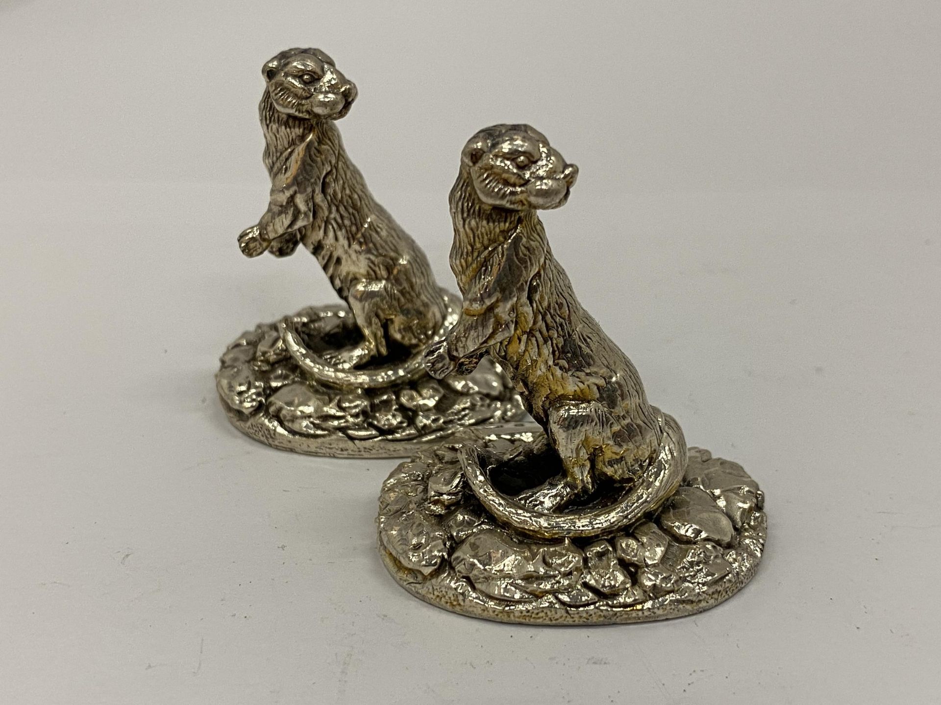 TWO HALLMARKED SILVER FILLED CAMELOT SILVERWARE LTD OTTER FIGURES