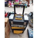 A PLASTIC MOBILE WORK CENTRE TOOL TROLLEY