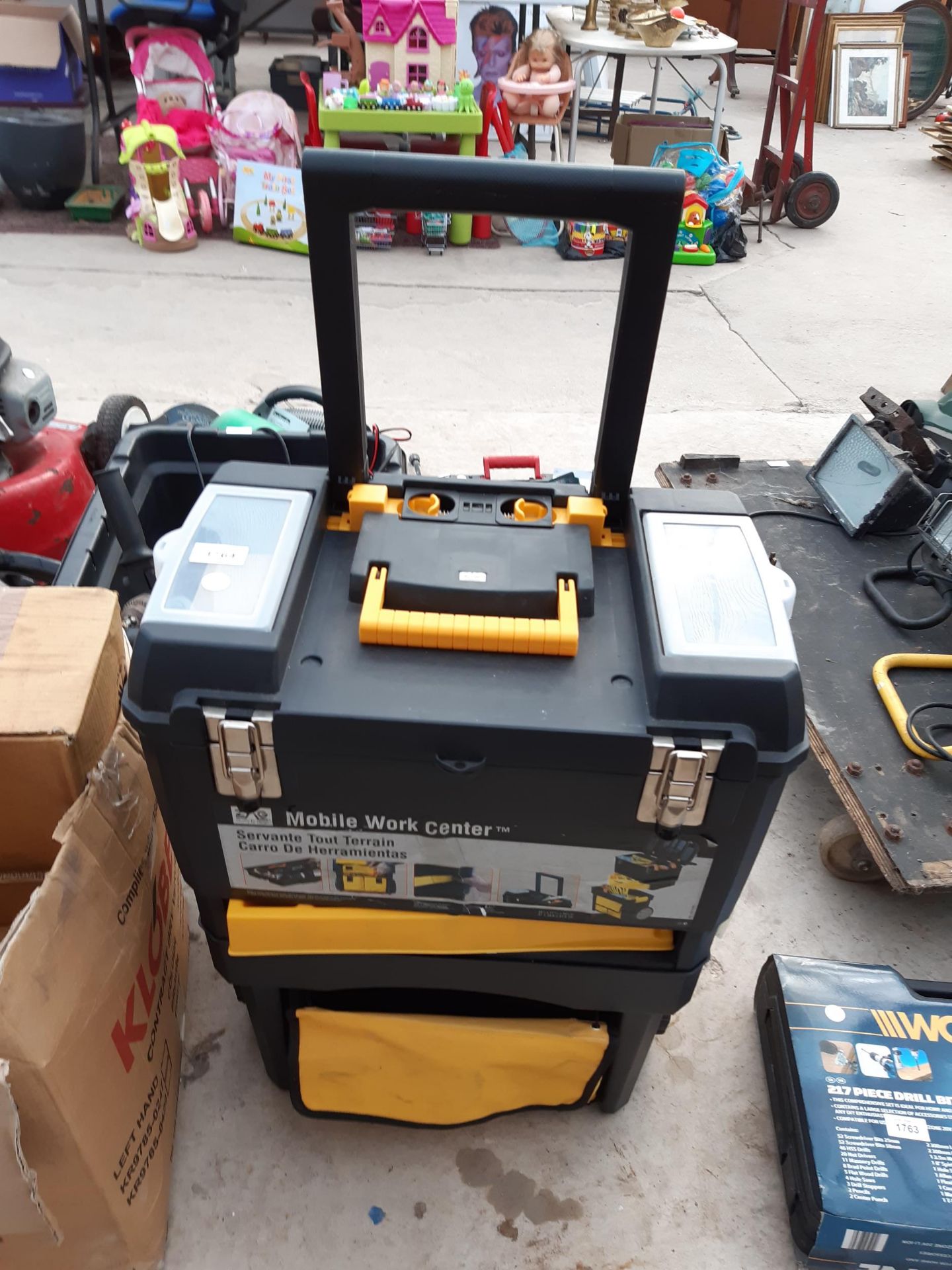 A PLASTIC MOBILE WORK CENTRE TOOL TROLLEY