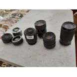 AN ASSORTMENT OF CAMERA LENS' TO INCLUDE A MACRO HUNTER AUTO LENS AND A MIRANDA LENS ETC